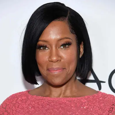 Regina King wears a bob hairstyle with a deep side part 