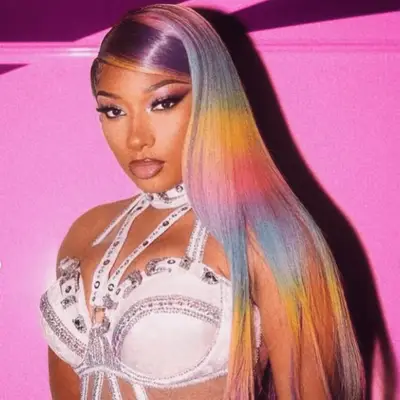 megan thee stallion wearing long rainbow hair