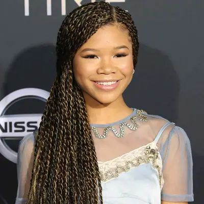 Storm Reid with honey blonde twists on the red carpet