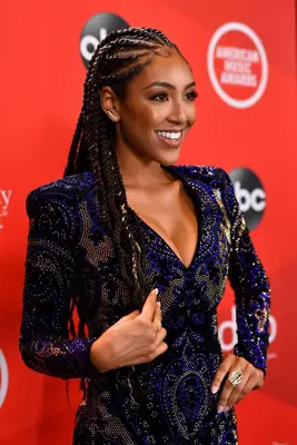 Tayshia Adams wearing cornrows on red carpet