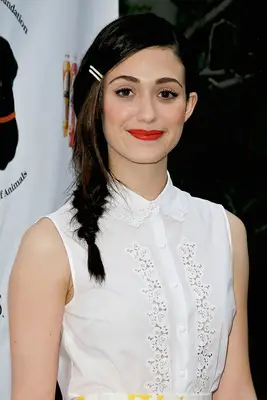 Emmy Rossum with side braid and bobby pins