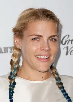 Busy Phillips with blue pigtail braids