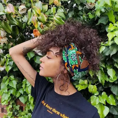 Person with a scarf in her hair