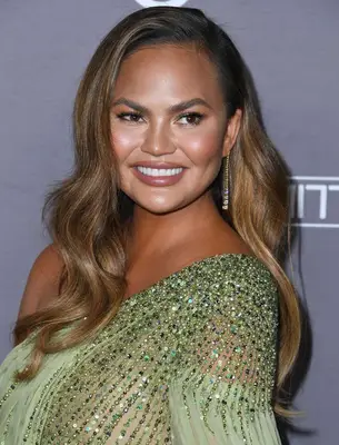 Chrissy Teigen long sleek waves