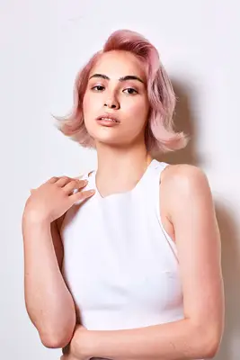 woman with pastel pink hair