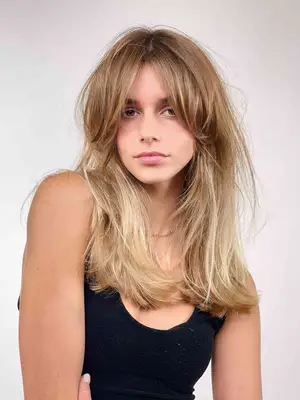 woman with blonde shag haircut