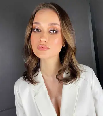 woman with warm brown highlights