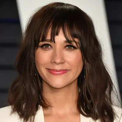 Rashida Jones wavy shoulder-length hair with choppy bangs