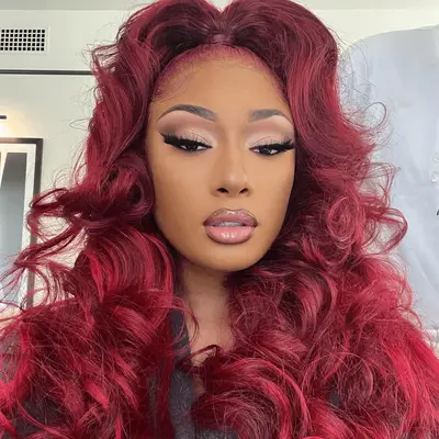 Megan Thee Stallion with cherry coke hair 