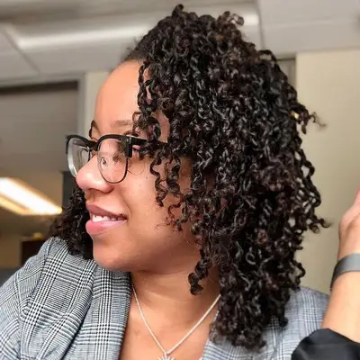 Woman wears subtle mini twists hairstyle