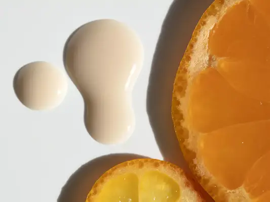 oranges and a drop of a vitamin c product