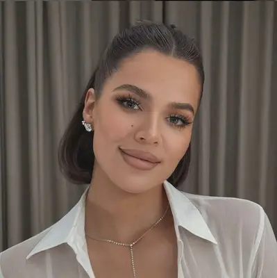 Khloe Kardashian wearing half up and half down bob hairstyle