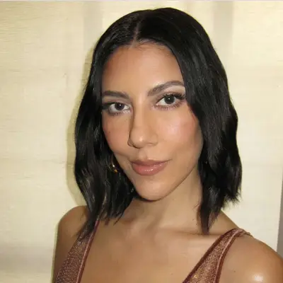 Stephanie Beatriz wears a wavy Italian bob hairstyle