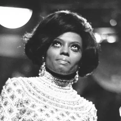 Diana Ross wears a voluminous bob hairstyle in the late 1960s