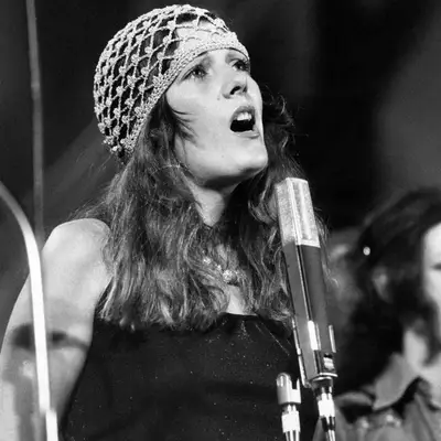 Caterina Caselli with a crochet headpiece