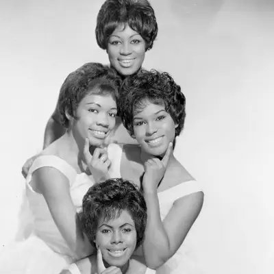 The Shirelles wear short hairstyles with baby bangs in 1970