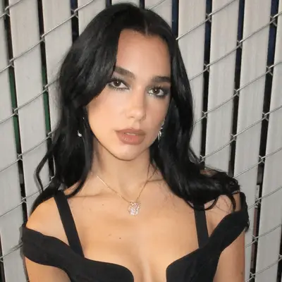 Dua Lipa With Shiny Hair With Loose Waves