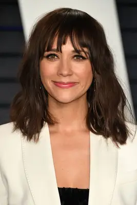 Rashida Jones wavy shoulder-length hair with choppy bangs