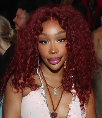 SZA with red curly hair 