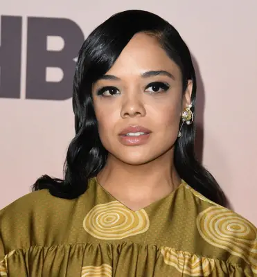 Tessa Thompson sleek, shoulder-length waves