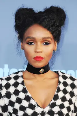 Janelle Monae curly space buns 