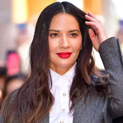 Olivia Munn wears black-to-brown ombre hair and red lipstick