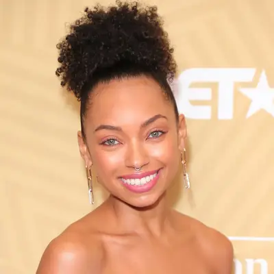 Logan Browning with a curly high pouf at the 2020 American Black Film Festival Honors Awards Ceremony in Beverly Hills, California