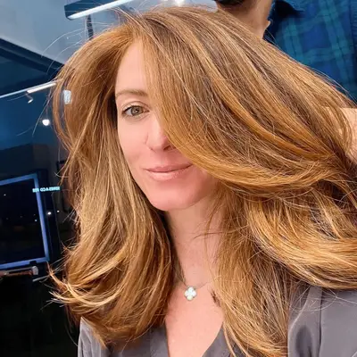 Layered copper and strawberry blonde hair