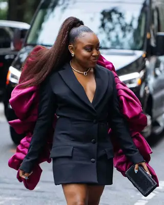 Ciara wearing a messy bun hairtstyle