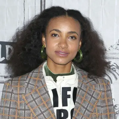 Esperanza Spalding wearing her hair in a brushed out style