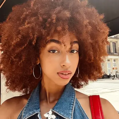 womab with curly copper hair