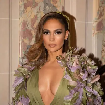 Jennifer Lopez with a long layered bob styled with a ribbon