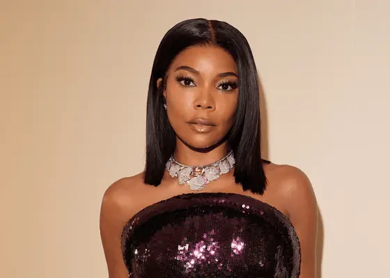 Gabrielle Union with shoulder-length straight hair and a middle part