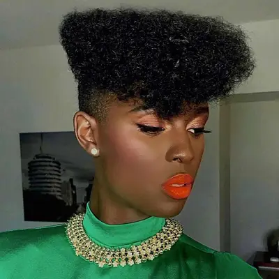 Jodie Turner-Smith wears a fade haircut with a voluminous geometric top