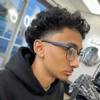 curly hair with cropped sides 