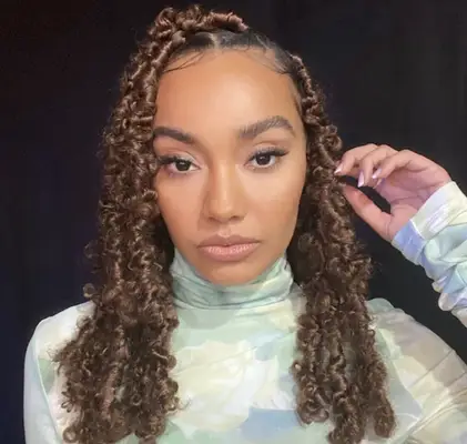 Leigh Anne Pinnock wearing butterfly locs