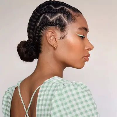 Person wearing low braided bun
