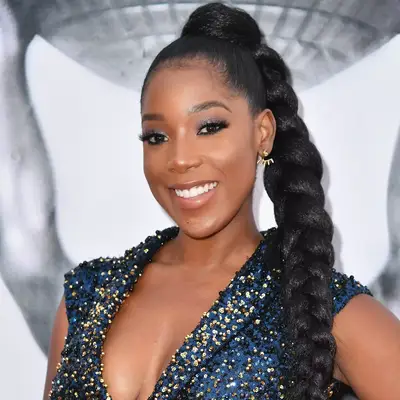 Person wearing braided ponytail with extensions