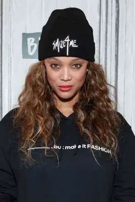 Tyra Banks with curly waves