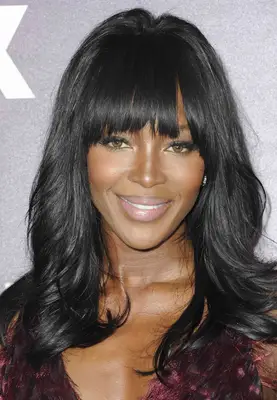 Naomi Campbell with choppy waves and bangs