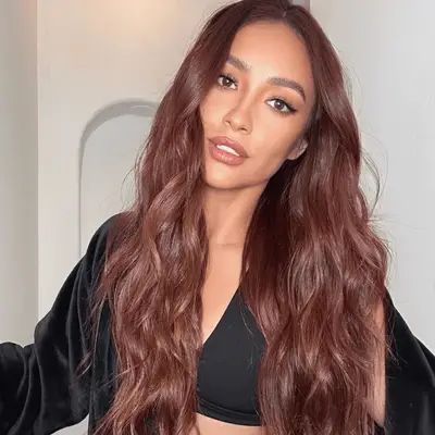Shay Mitchell with cherry cola long waves hair