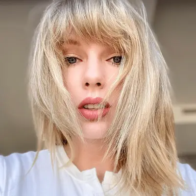 Lucy Hale sleek, straight bob with headband