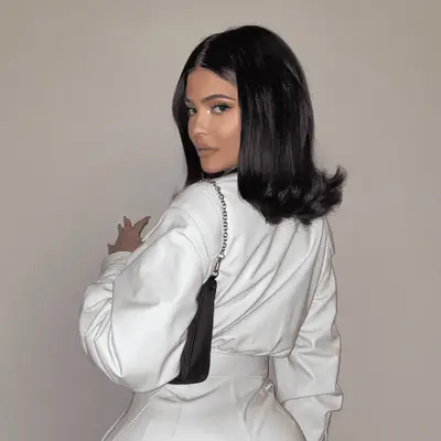 kylier jenner with short hair wearing white jumpsuit