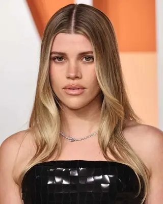 Sofia Richie wearing a strapless outfit