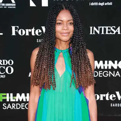 Naomie Harris with twisted ombré hair at the 2022 Filming Italy red carpet in Santa Margherita di Pula, Italy