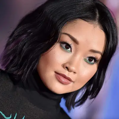 Lana Condor with short black hair and purple highlights at the 2019 
