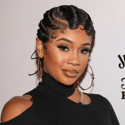 Saweetie wears finger waves pixie to ack Daniel