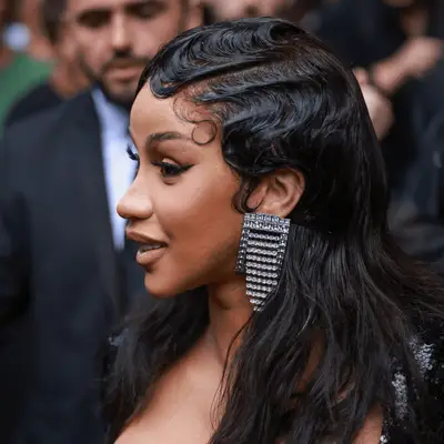 Cardi B wears finger waves mullet to Balenciaga Paris Fashion Week Fall/Winter 2023/2024