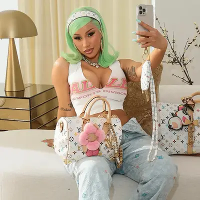 Cardi B with pastel green hair