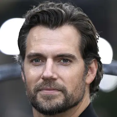 Henry Cavill with long, outgrown thinning hair at 